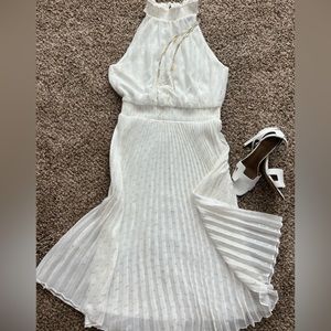 White summer dress with pleated skirt